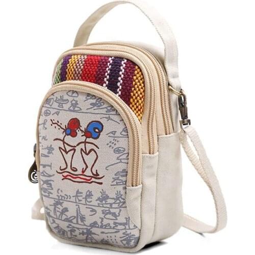 Cartoon Dongba phone bag ladies mini portable messenger coin purse cute embroidered cross-bag canvas student small messenger bag