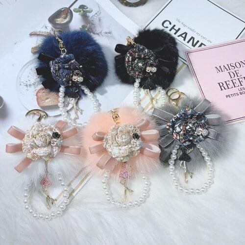 Creative Camellia Fox Hair Ball Keychain Pearl Chain Bag Pendant Female Car Key Accessories Ring