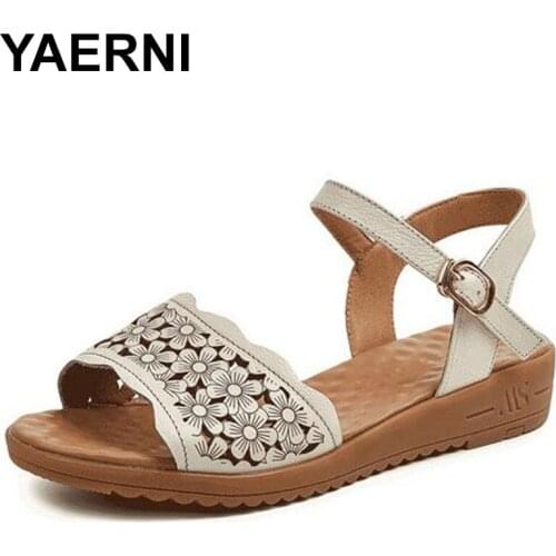 YAERNI Promotional cowhide flower summer shoes woman fashion sandals 2020 soft sole non-slip clothing flat sandals summer casual
