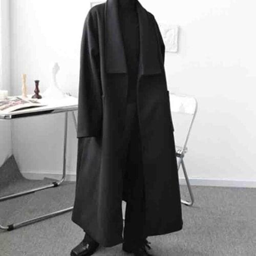 The new design feeling windbreaker male Korea edition loose tide brand handsome over the knee in the long section thickens the