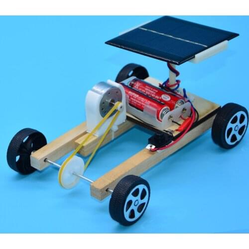 Science and technology small production of wooden solar car electric creative science experiment students put together toys