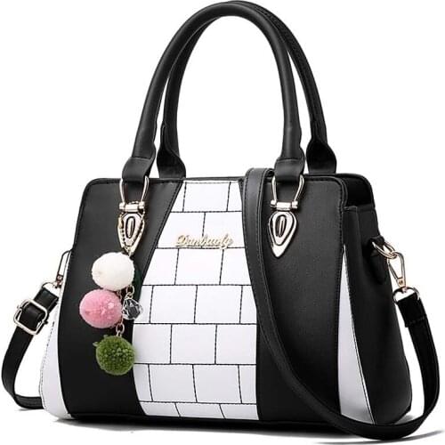 2020 new womens bag hit color hair ball handbag European and American one-shoulder diagonal mother bag ladies bag