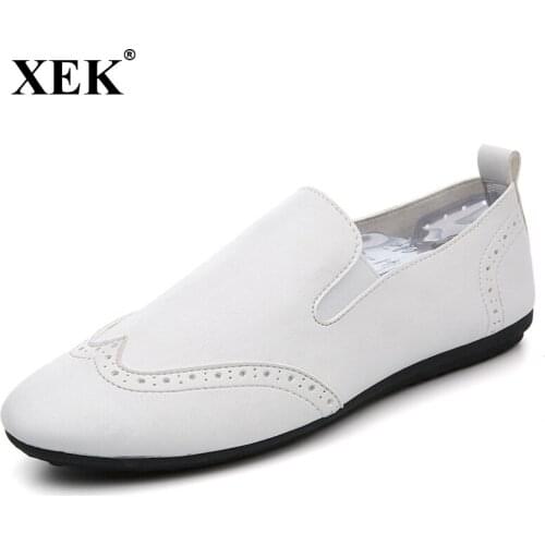 New Men Mocassin Loafers Men shoes Casual Slip on Brogue style Fashion White Black Driving shoes Men flat shoes ST57