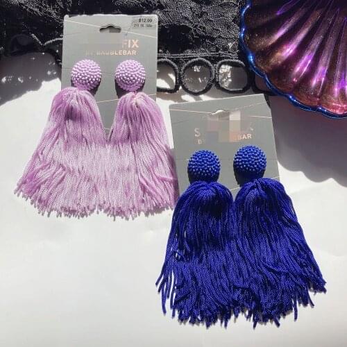 Hand-made by Europe and the United States jewelry tassel shuang long long purple earrings wind exaggerated earrings
