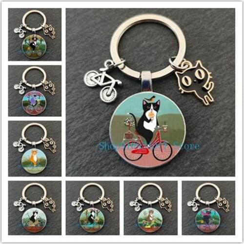 Creative fashion bicycle cartoon cat round glass keychain DIY handmade bicycle black cat pendant round glass decoration keychain