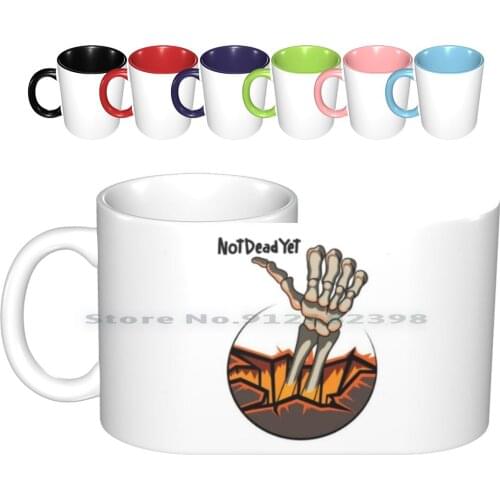 Not Dead Yet Logo Ceramic Mugs Coffee Cups Milk Tea Mug Not Dead Yet Logo Skelehand Skeleton Thumbs Up Fire Glow Ndy Creative