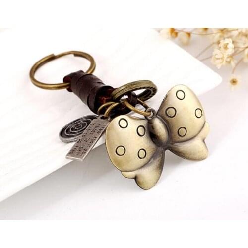 10pcs/lot Fashion woman man leather owl keychain unisex metal owl giraffe bear bow key ring