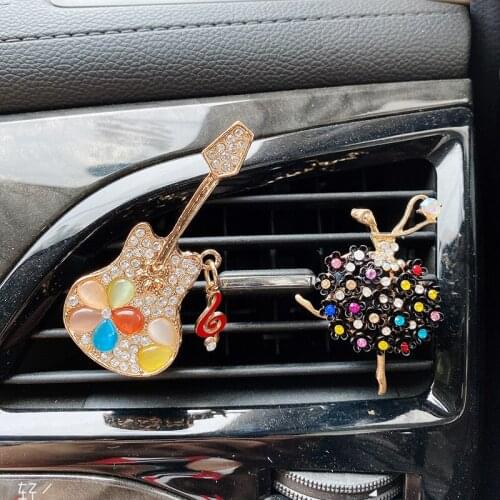 Car air conditioning air outlet perfume clip cartoon dancing girl car aromatherapy car perfume creative guitar car interior