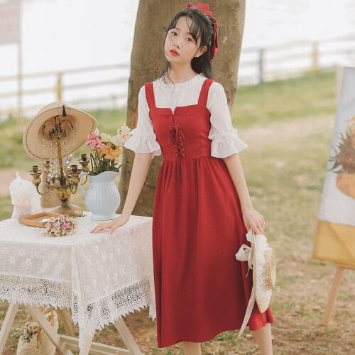 Sweet suit female 2021 summer new age-reducing girl ruffled shirt strap strap two-piece dress