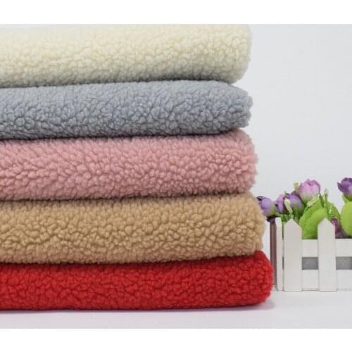 Pure color lamb wool polyester granulated cashmere lamb plush fabric pajamas toy floor mat sweater composite fabric