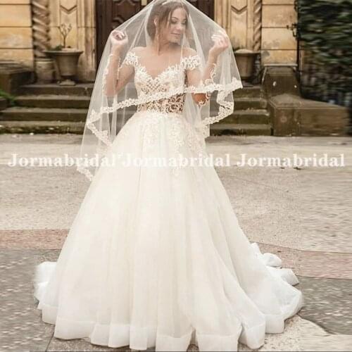 Elegant Lace Appliques Wedding Gowns For Bride Long Sleeves Nude Soft Tulle Transparent Buttons Back Beach Wedding Dress Boho