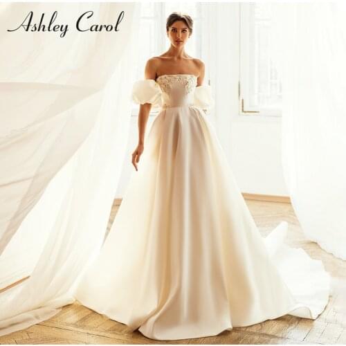 Ashley Carol A-Line Wedding Dress 2021 Modern Strapless Beaded Embroidery Satin Bride Puff Sleeve Backless Princess Bridal Gowns