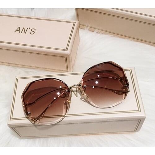 Free INS Gradient Sunglasses Women Rimless Sunglasses Trimmed Metal Curved Temples Sun Glasses All-match Decorative Glasses