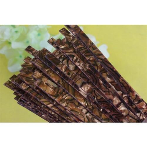 PVC white color 5 STRIP COFFEE PEARL CELLULOID BINDING,Measures 2mm x 1.5mm thick and 1650mm