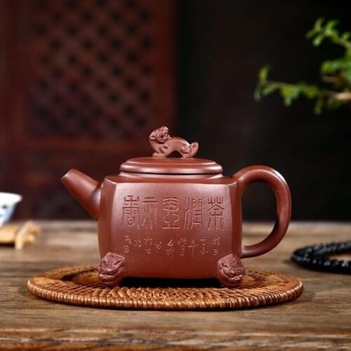 Undressed ore famous purple clay Xu Yichun square sculptures carved by hand draw four Long Ding recommended the teapot