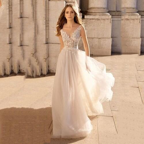 Sleeveless Wedding Dresses 2021 Lace Applique O-neck Wedding Gown Beach Bridal Gowns Backless Robe De Mariee For Women