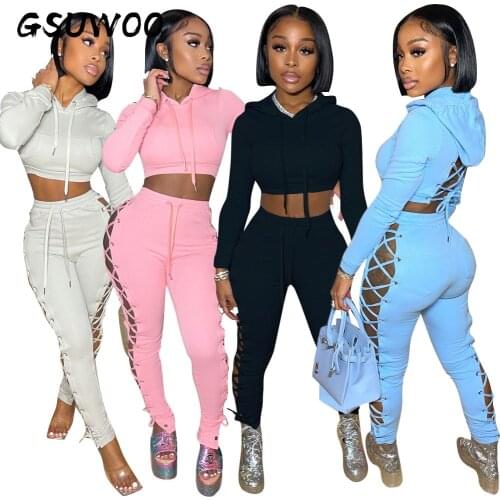 GSUWOO Autumn Winter Fashion Women Eyelet Lace-up Pants Set Sexy Hollow Out Open Back Long Sleeve Hooded Sweatshirt Pants 2pcs