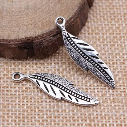 Free shipping 43pcs 32x9mm antique silver feather charms diy retro jewelry fit Earring keychain hair card pendant accessories