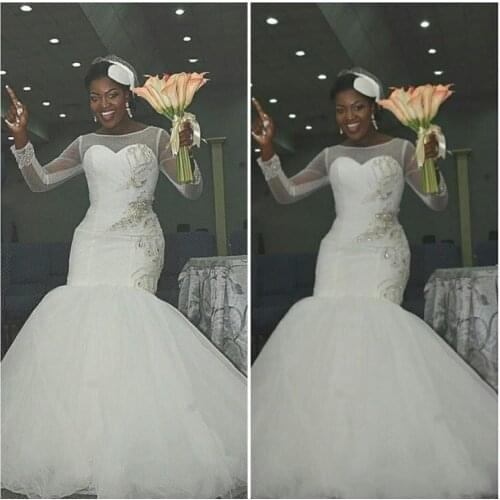 Africa Mermaid Long Sleeves Sexy Wedding Dresses Sheer Jewel Neck Luxury Beaded Crystals Plus Size Bridal Gown