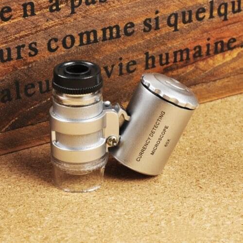 1PC 60x Magnifying Mini 60X Jewelry Magnifier Microscope Magnifying With 2 LEDs And UV Light Pocket Jeweler Zoom Tool