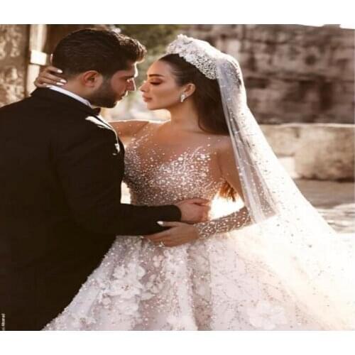 2019 Dubai Luxury Crystal Wedding Dresses Shiny Beaded 3D Flower Wedding Gowns With Sheer Full Sleeves Pearls Vestido De Noiva