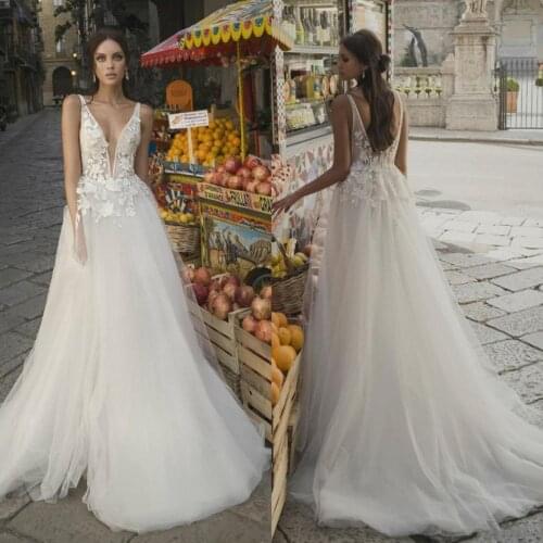 Charming A Line Wedding Dresses Deep V Neck Lace Beach Backless Bridal Gowns Sweep Train Tulle Boho robe de mariée