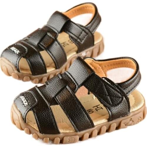 Childrens sandals 2021 summer childrens leather face Baotou soft sole boys' sandals fashion solid color Velcro girls' sandals