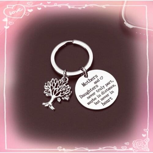 Keychain stainless round pendant "Mother and daughter never really separate maybe in the distance but never in the heart