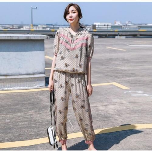 Temperament simple nine-point pants suit 2021 new women summer casual fashion hooded short-sleeved two-piece sets s206
