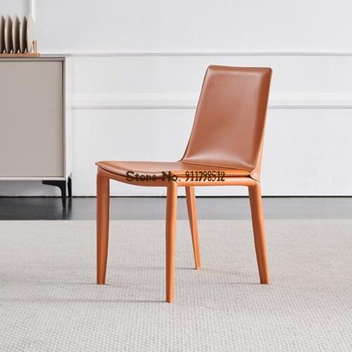 Leather chair modern minimalist dining chair chair makeup chair Nordic chair back chair saddle chair light luxury dining chair
