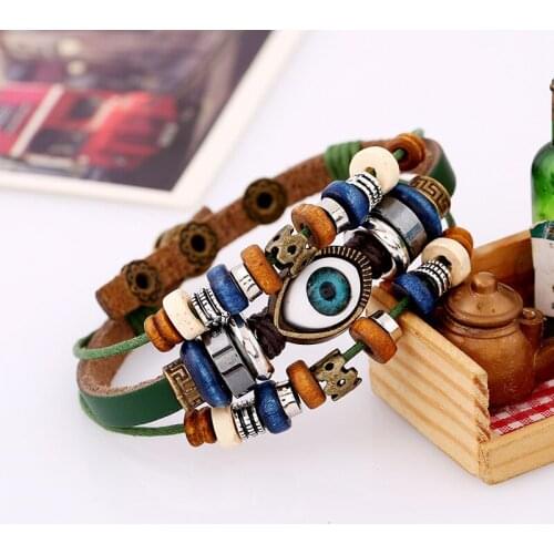 WANGAIYAO new fashion temperament beaded multi-layer beaded eyes cowhide bracelet pull adjustment couple leather bracelet jewelr