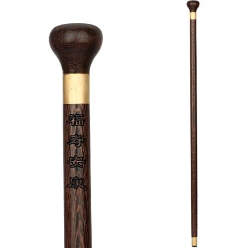 The old mahogany cane round wood wooden wings trumpet stick of civilization