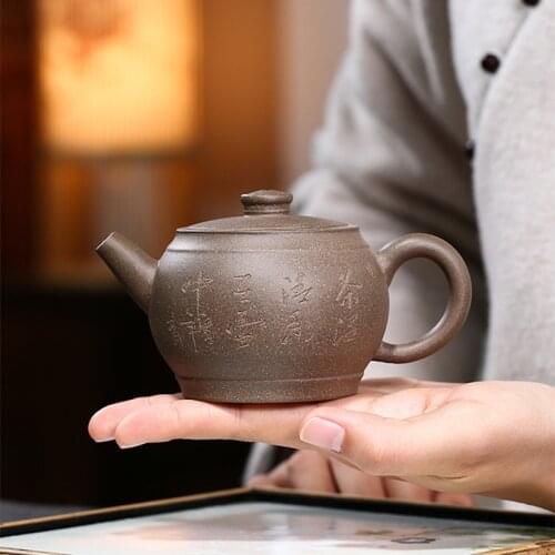 Ball shaped infuser holes true yixing zisha original ore qinghui duan clay marked tea pot Chinese character carved pot of tea