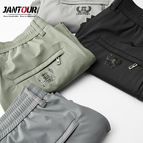 High quality Summer New Mens Business Casual Pants Zipper pocket Fashion Solid Color Stretch Jogging Slim Fit Trousers Male