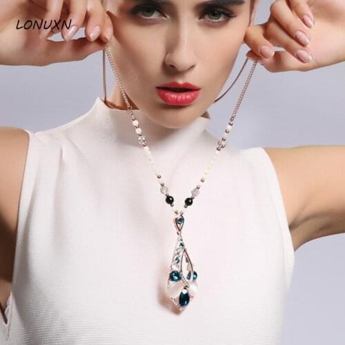 Gold OL temperament Natural semi-precious stones Opal blue crystal water drops sweater chain female long necklace lovers gift