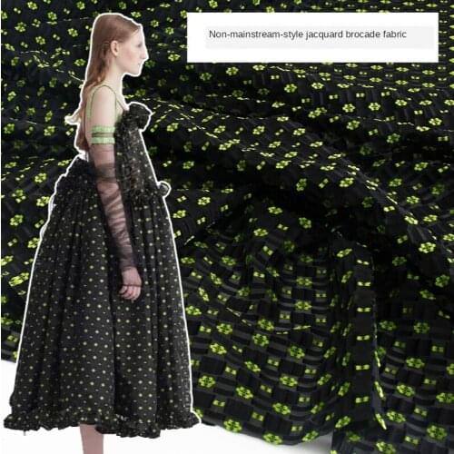 European and American brand fashion personality tapestry jacquard black bottom small green flower clothing slightly stiff fabric