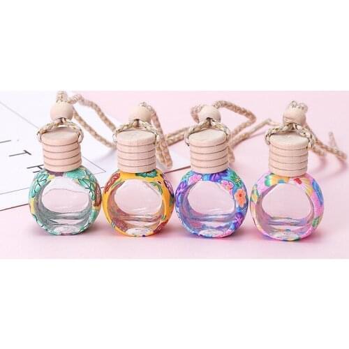 300pcs Car Air Freshener Perfume Bottle Aromatherapy Fragrance Essential Oil Diffuser Hanging Perfume Pendant Auto Ornaments