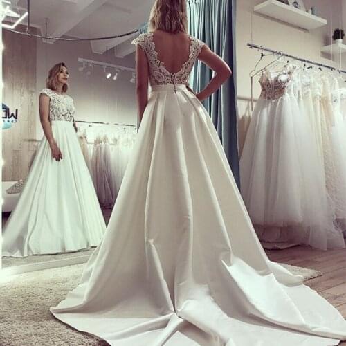 Elegant A-line Wedding Dress Cap Sleeves Backless Chapel Train Bridal Gowns Vintage Appliques Vestido De Novia Wedding Gowns