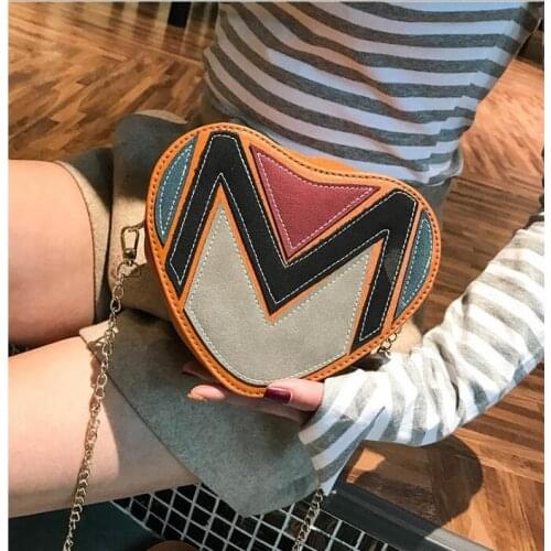 2020 brit New fashion single shoulder bag across zero purse bag, cool womens bag messenger bag peach heart chain