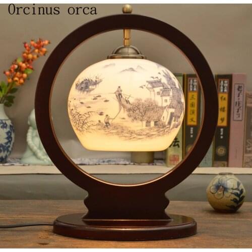 New Chinese antique creative ceramic table lamp bedroom bedside lamp American Pastoral flower painting solid wood desk lamp