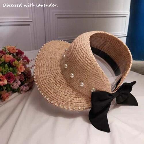 Obsessed with lavender. Lafite straw hat female summer Pearl Bow Hat Hat split large brim Beach Hat Beach Sun Hat