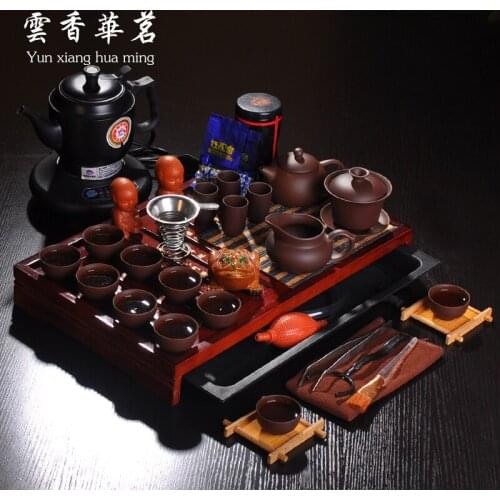 The kettle tea of Purple sand pottery and porcelain tureen tea cozy group Solid wood tea tray tea ceremony
