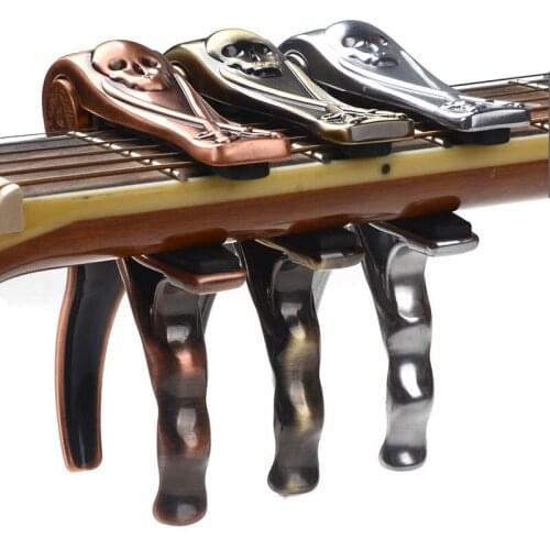 Bronze Metal Acoustic Capo Quick Change Trigger Key Skull Cappo Clamp For Acoustic Guitar Three Colors