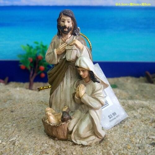 In Manger group, Jesus was born, father, mother and baby, hanging ornaments, religious figures and sand utensils