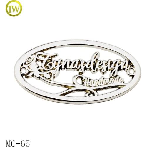 High quality gunmetal 2 holes sewing metal clothing label custom logo metal tag