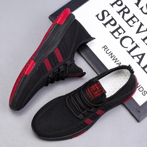 Mens trendy shoes, low-cut flying woven sneakers, comfortable soft-soled casual shoes, spring new Korean style breathable wild