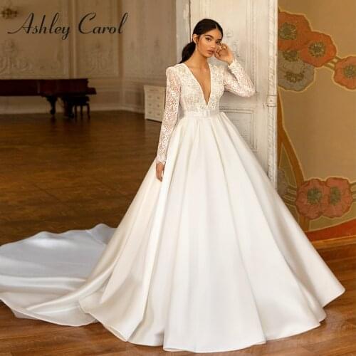 Ashley Carol A-Line Wedding Dress 2021 Dreamy Beaded Appliques V-Neck Lace Long Sleeve Bride Satin Backless Princess Bridal Gown