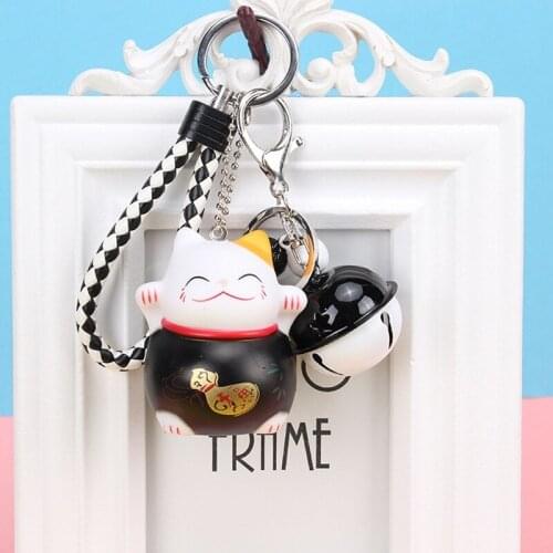 Cartoon Five Fu Caicai cat bag bag pendant creative leather rope woven car key chain pendant