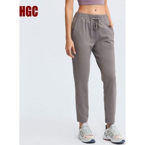 HGC Sport Trousers Women Leisure GYM Fitness Pants with Two Side Pocket Cropped Trousers Loose High Quality Breathable Elastic