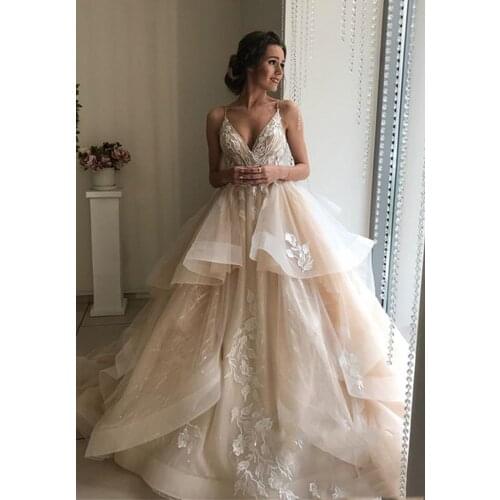 2020 A Line Wedding Dress Spaghetti Straps Sexy V Neck Lace Appliques Bridal Gown Elegant Backless Tiered Skirts Wedding Gowns